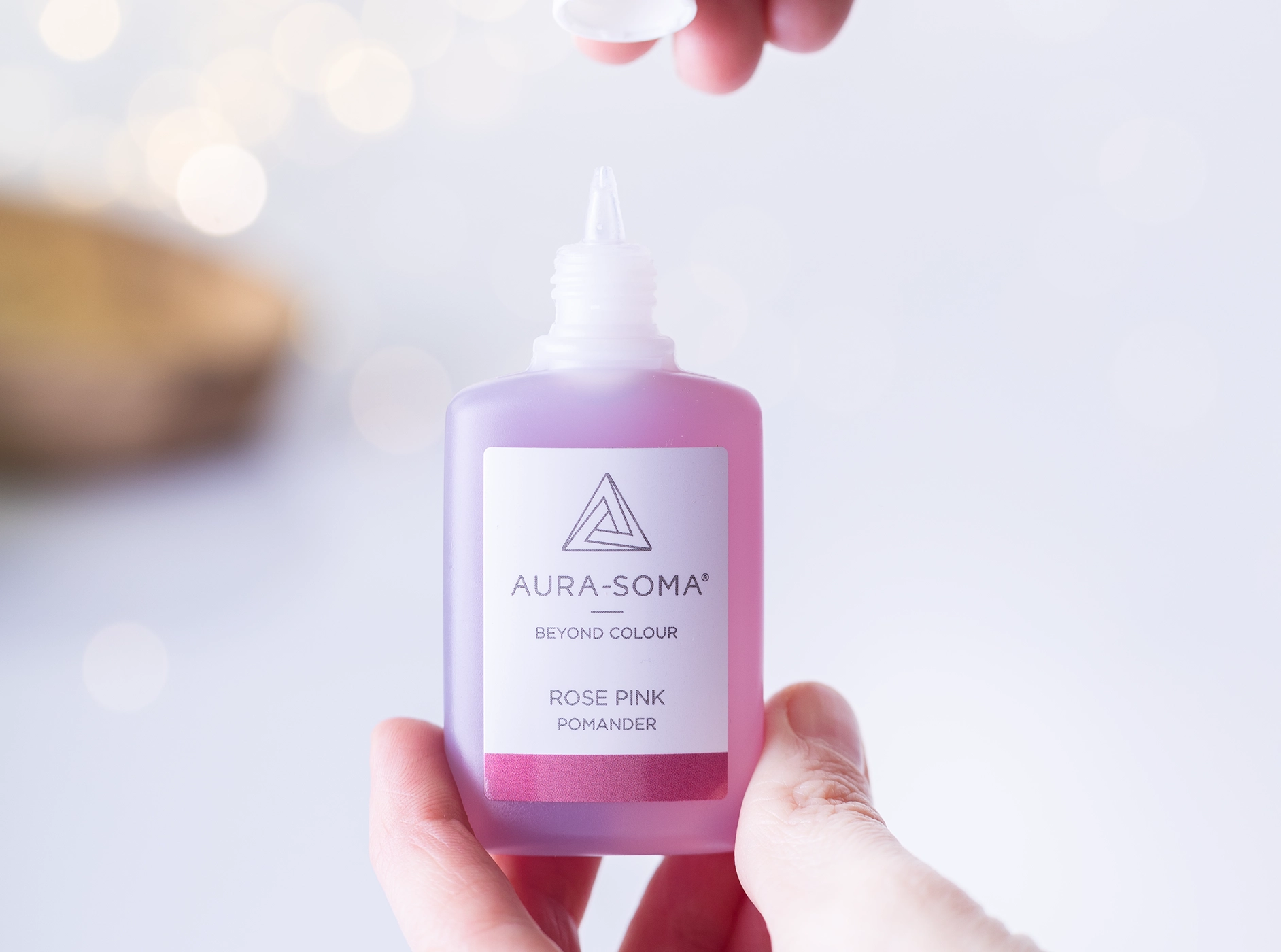 Aura-Soma Pomander auf hellem Hintergrund